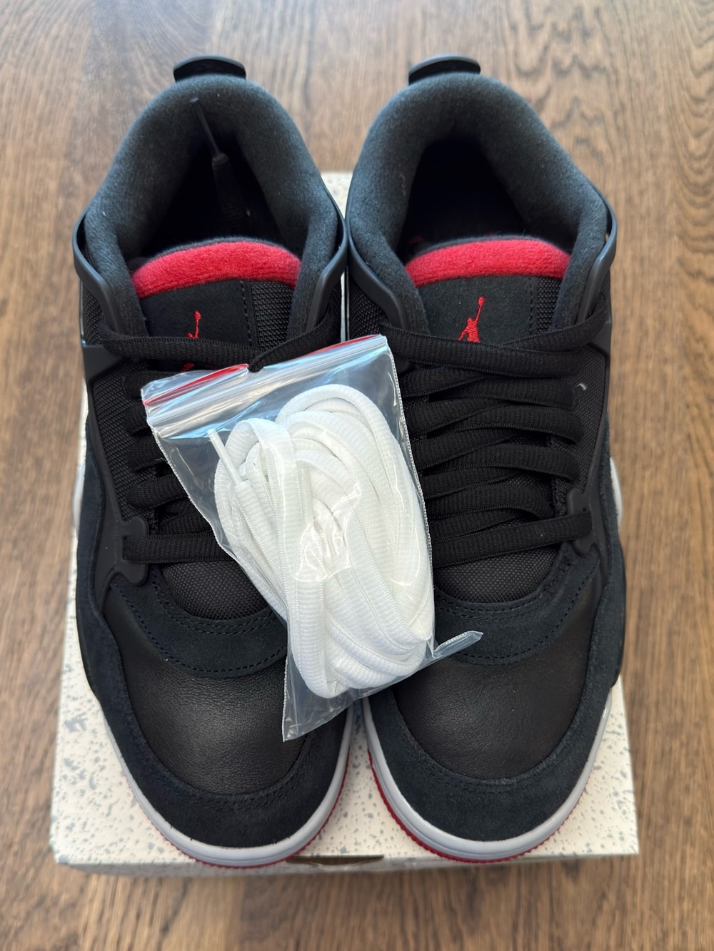 Air Jordan 4 RM Black Red Varsity Red Wolf Grey FQ7939-061 Men's 9/Women's 10.5